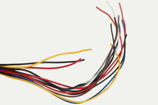 bundle of colored single core wires, copy space, close-up, horizontal, isolate