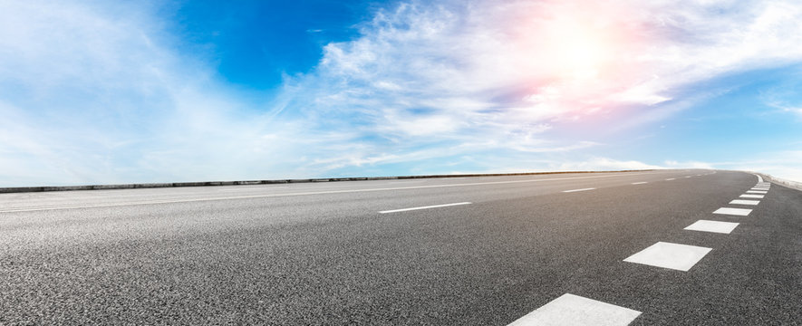 Empty highway road and sky clouds landscape,panoramic view