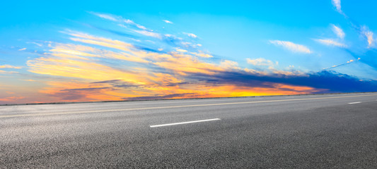 Asphalt road and sunset sky,panoramic view