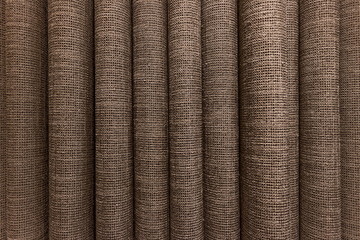 Corrugated pattern and textured of the brown fabric curtains or the drape inside the room with interior decoration
