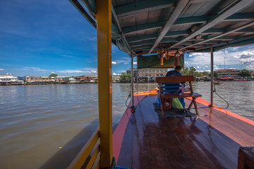 Amphawa Floating Market-Samut Songkhram:June1, 2019,atmosphere in the floating market,the community has boats to sell goods,tours and various product for tourists to visit in the area.Amphawa,Thailand