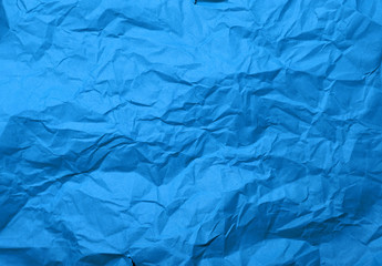 Crumpled blue paper texture