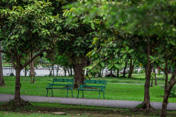 The blurred background of modern design chairs placed for tourists to sit in the park or while traveling
