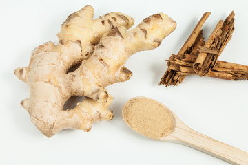 Ginger root and cinnamon ; photo on neutral background