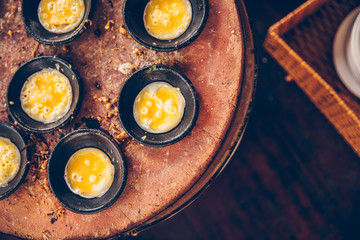 Vietnamese mini fried eggs, cooking on the street - Traditional Vietnamese food