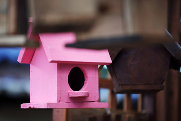 colorful wooden bird house background.
