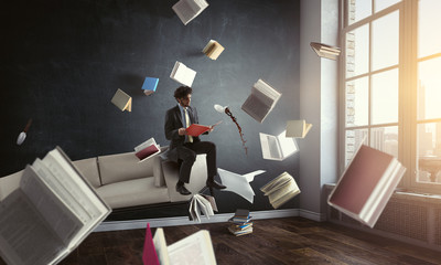 Young man reading a book. Mixed media