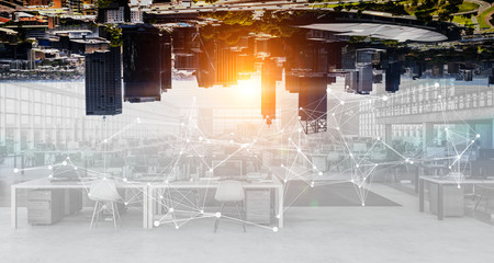 City and buildings on summer evening mixed with indoor office interior