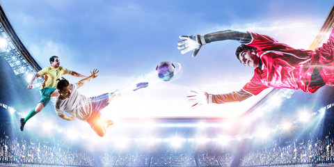 Soccer player on stadium in action. Mixed media