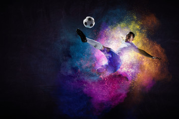 Soccer player in action. Mixed media