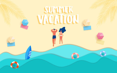 Top view blue sea paper waves and beach . Hot girl and guy on the beach sunbathe in summer season.