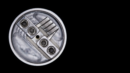 close up, macro shot, top view of single fused clapton coil in bottom feed squonk rebuildable...