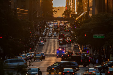 Sunset over 42nd Street with the colorful lights of traffic through Midtown Manhattan, New York City NYC