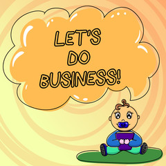 Writing note showing Let S Do Business. Business photo showcasing one sells goods or services to others or countries Baby Sitting on Rug with Pacifier Book and Cloud Speech Bubble