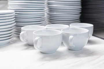 Group of empty coffee cups of white cup for service tea or coffee in breakfast or buffet and seminar event of catering and cocktail concept
