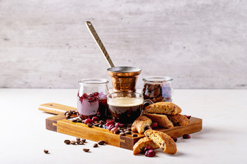 Cup of espresso coffee with cranberry cantucci