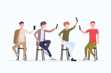 men in different poses taking selfie photo on smartphone camera casual male cartoon characters group sitting on chair posing white background flat full length horizontal