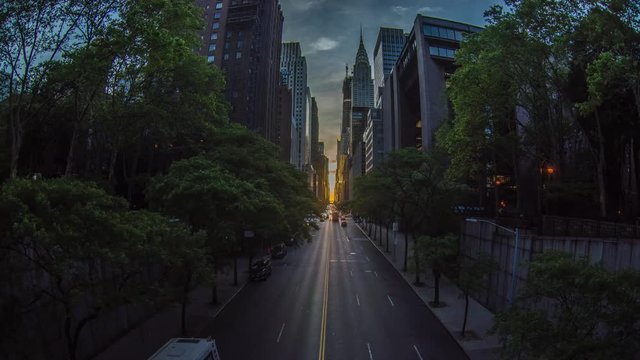 Time Lapse: Sunset over 42nd Street with the colorful lights of traffic through Midtown Manhattan, New York City NYC