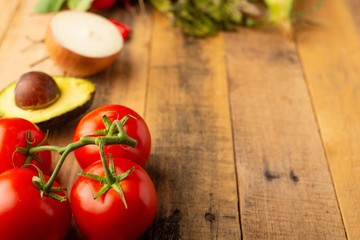 Fresh set of vegetables on a wooden background with space. Colorful background. Vegetarian sets. Harvest. Gastronomy