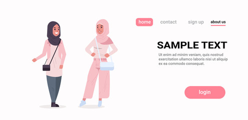 couple arabic women in hijab discussing arab girls wearing headscarf traditional clothes standing together communication concept full length horizontal copy space flat