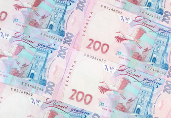 Ukrainian money. Hryvnia paper bill. Notes in denominations of two hundred hryvna. Uah. Cash. Background texture.