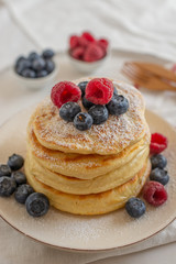 home made sweet pancakes with berries for breakfast