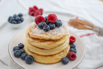 home made sweet pancakes with berries for breakfast