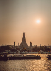 Fototapeta premium Wat Arun and other temples in Bangkok, Thailand.