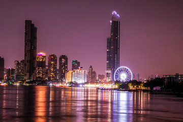Fototapeta premium Business architecture, skyscrapers and light trails, Close shot of skyscrapers with lights, Night building.