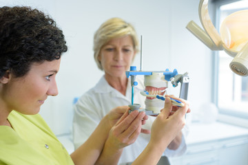 workers on dental prothesis