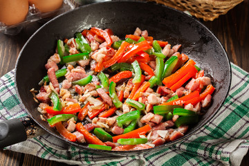 Frieding ingredients for preparing omelette