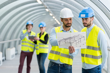 engineers in a tunnel