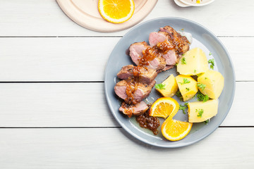 Roast duck breast with orange sauce