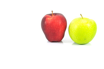 green apple and red apple on white