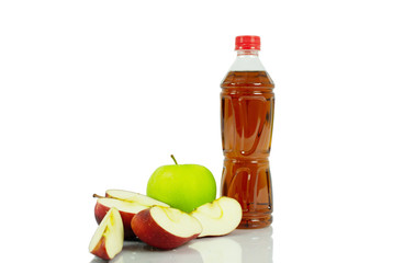 apple and bottle on white background.