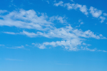 Beautiful cirrus clouds on bright blue sky