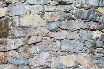 Wall of large natural stones.
