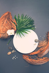 White circle basis leaf coconut shel stones dark