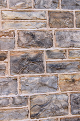 old stone wall of bricks