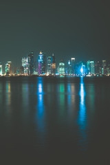 Doha skyline by night, in Qatar
