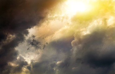 Sunlight breaks through storm clouds. Nature is waiting for a thunderstorm.