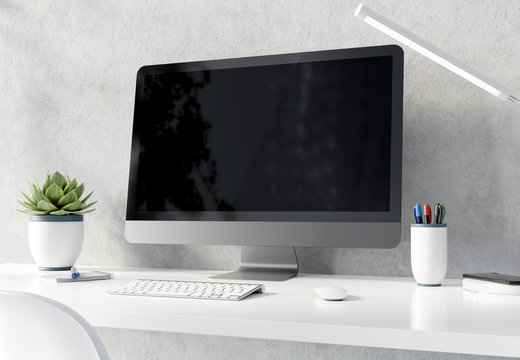 Modern black and silver computer on white desktop and concrete interior mockup 3D rendering