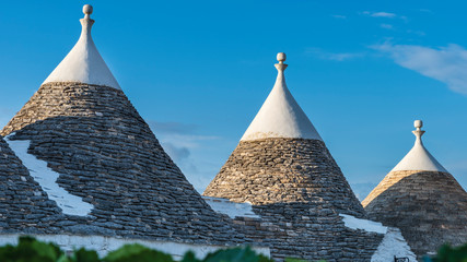 Trulli of the Itria valley. Details in the sky. Puglia, Italy.