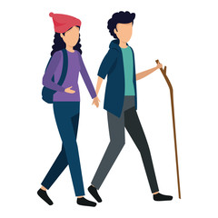 happy young couple walking with wood stick