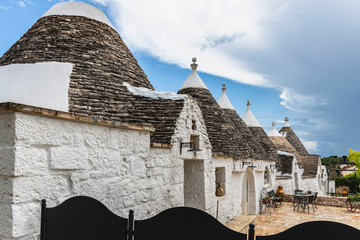 Trulli of the Itria valley. Details in the sky. Puglia, Italy.