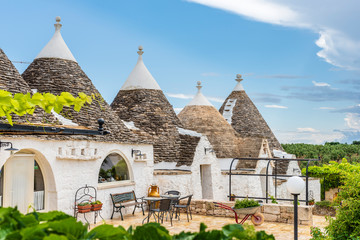 Trulli of the Itria valley. Details in the sky. Puglia, Italy.