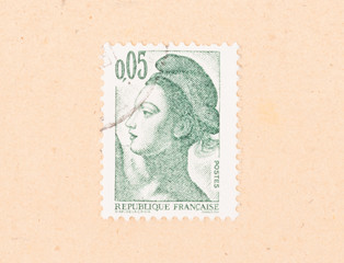 Fototapeta na wymiar FRANCE - CIRCA 1980: A stamp printed in France shows portrait of a woman, known as Liberty, after Eugene Delacroix, circa 1980
