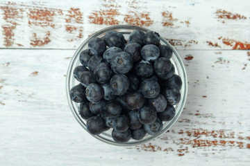 A glass bowl with blueberry	