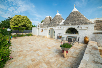 Trulli of the Itria valley. Details in the sky. Puglia, Italy.