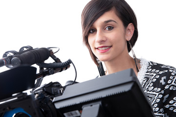 young woman with professional video camera, DSLR, on white